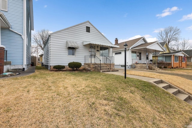 bungalow with a front lawn