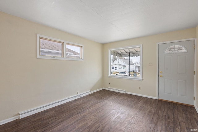 entryway with dark wood-type flooring, baseboards, and a baseboard radiator