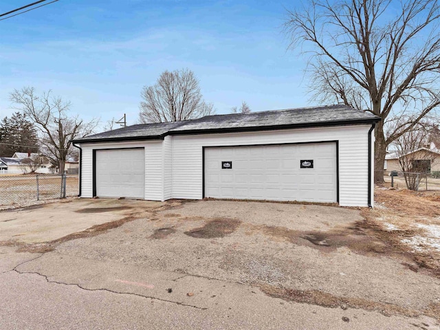 detached garage with fence