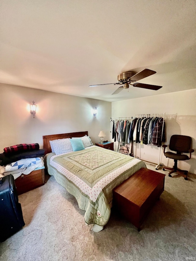 carpeted bedroom with a ceiling fan