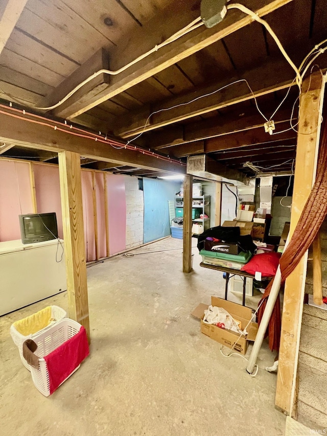 unfinished basement with stairs