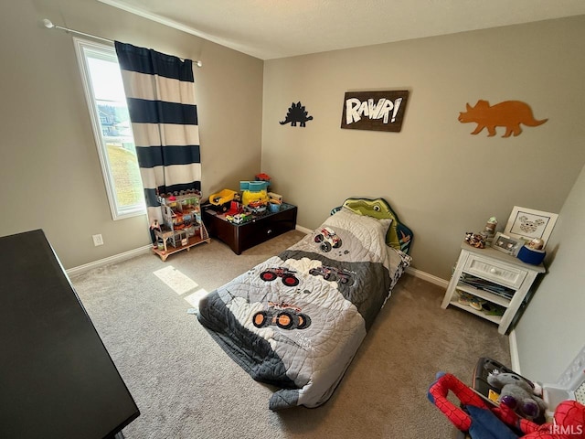 carpeted bedroom with baseboards