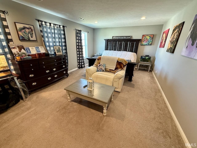 carpeted bedroom with visible vents, recessed lighting, baseboards, and a textured ceiling