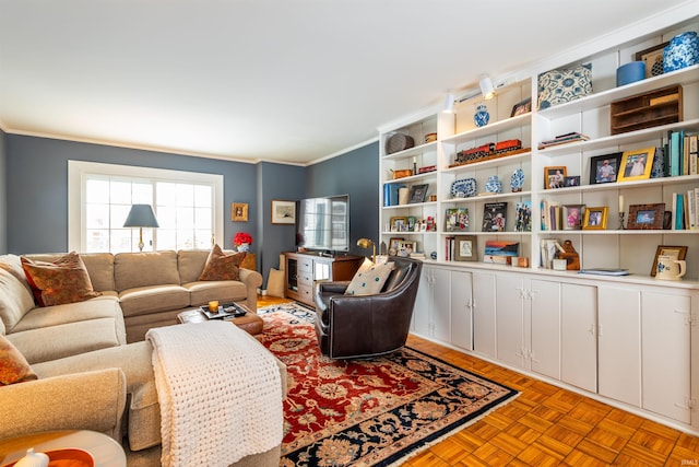 living room featuring crown molding