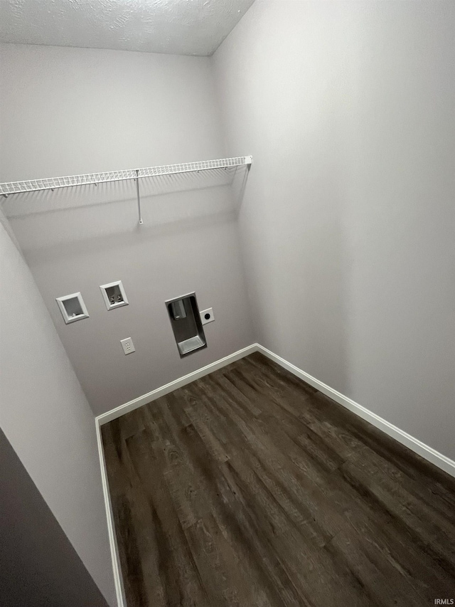 washroom featuring hookup for a washing machine, baseboards, hookup for an electric dryer, dark wood finished floors, and laundry area