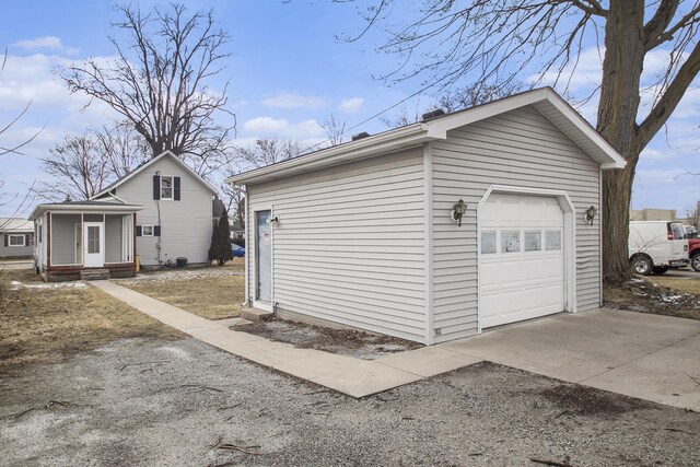 garage featuring driveway