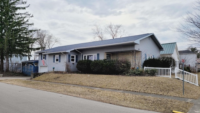 single story home featuring an attached garage