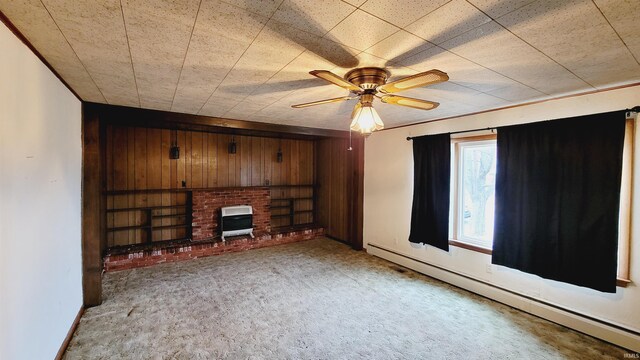 unfurnished living room with light carpet, a ceiling fan, and a baseboard radiator