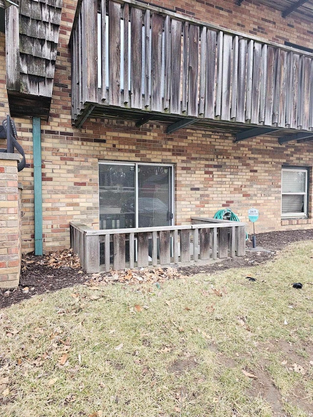 view of home's exterior featuring brick siding