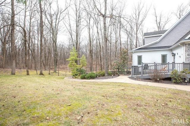 view of yard featuring a deck