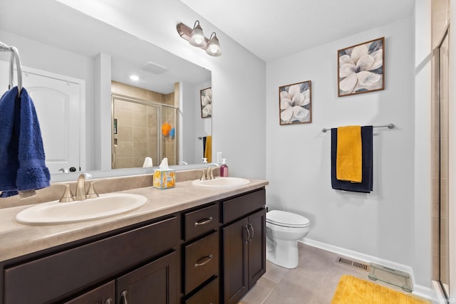 bathroom featuring double vanity, visible vents, a stall shower, and a sink