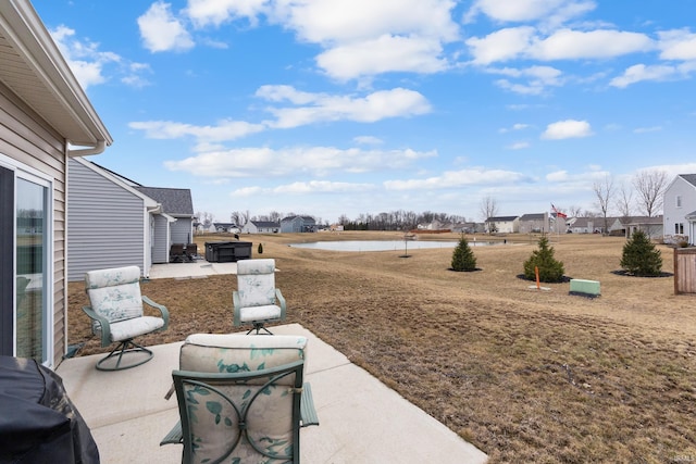 view of patio / terrace featuring a water view