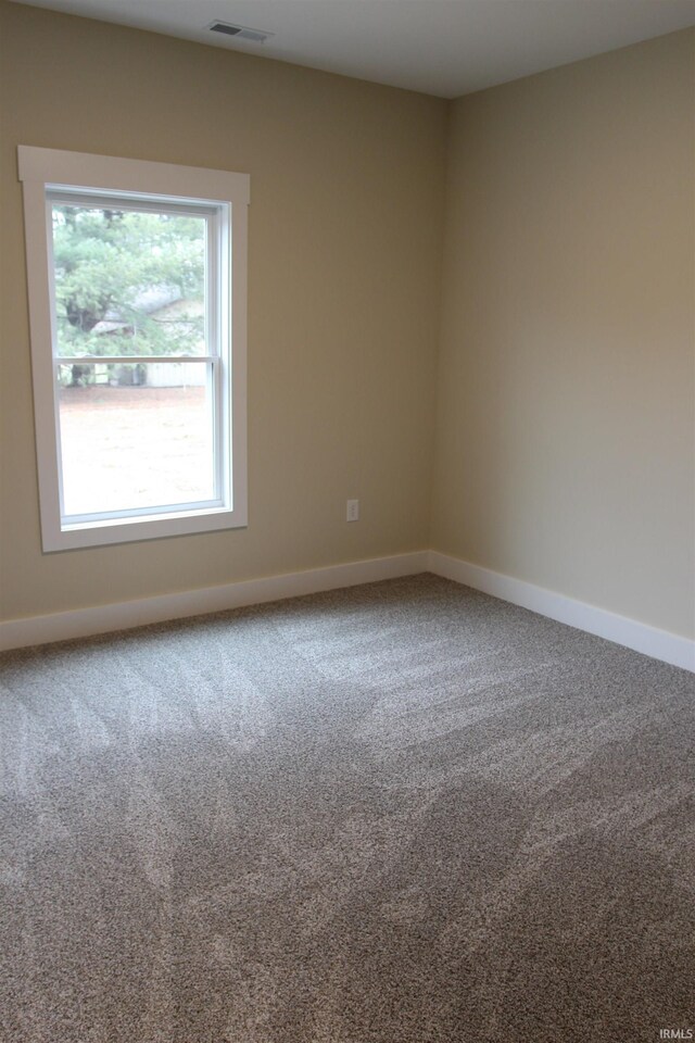 534 E Dogwood Ct, Spencer, IN 47460 - carpeted spare room featuring visible vents and baseboards