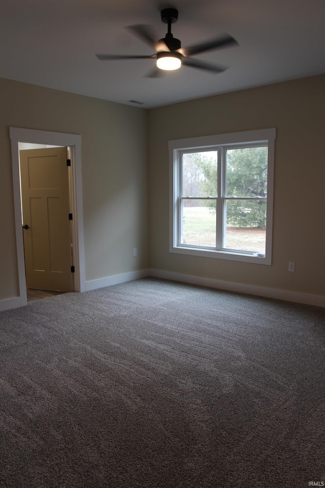 534 E Dogwood Ct, Spencer, IN 47460 - unfurnished room featuring carpet, baseboards, and ceiling fan