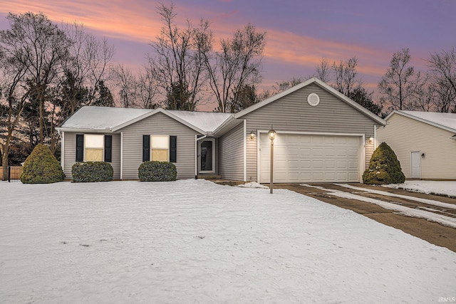 ranch-style home with a garage