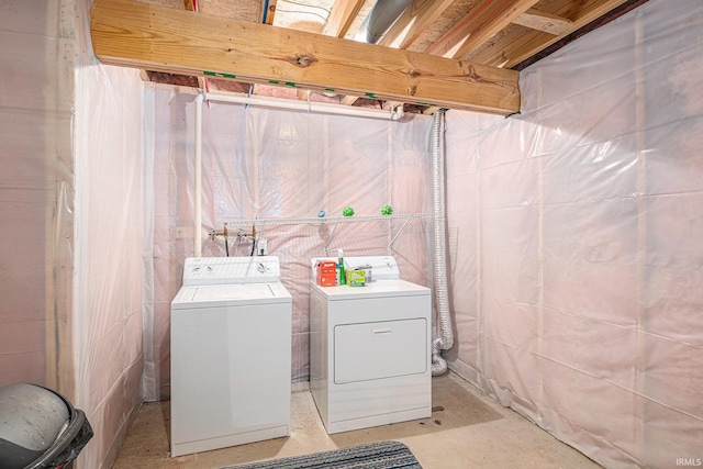 washroom featuring independent washer and dryer and laundry area