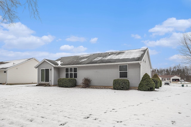 view of snow covered house