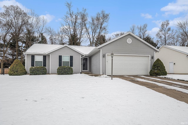 single story home featuring an attached garage