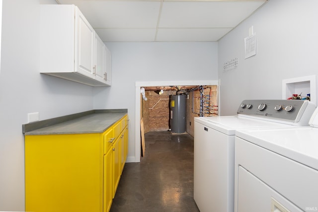 laundry room with cabinet space, electric water heater, and independent washer and dryer