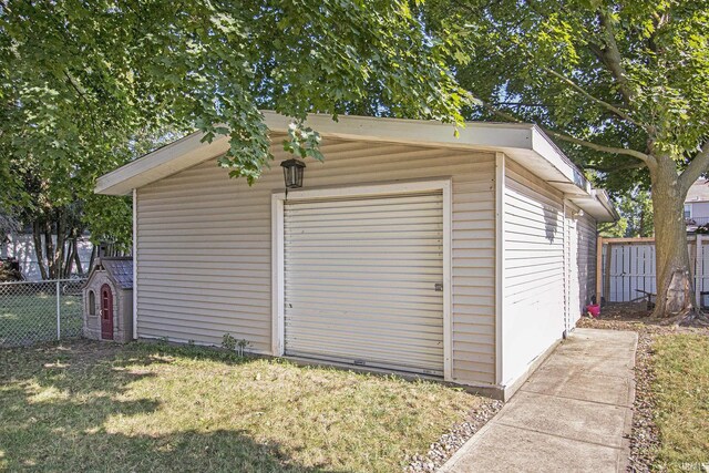 detached garage with fence