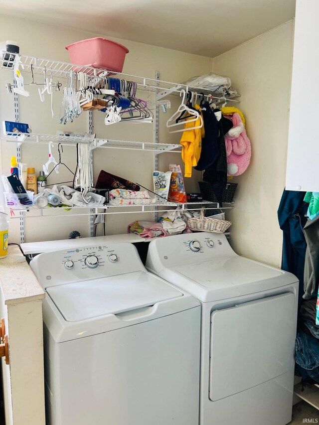 washroom featuring independent washer and dryer