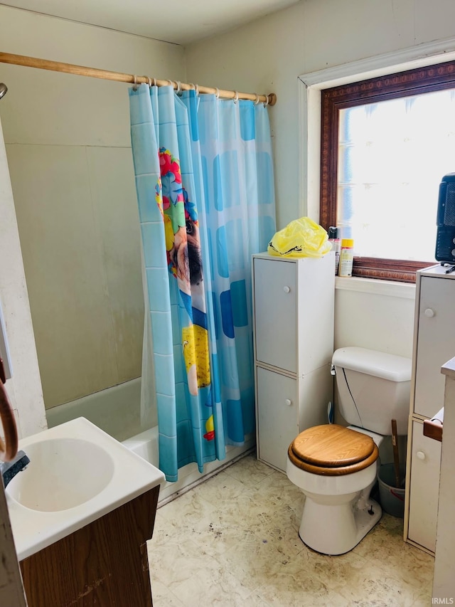 bathroom with vanity, tile patterned floors, shower / tub combo, and toilet