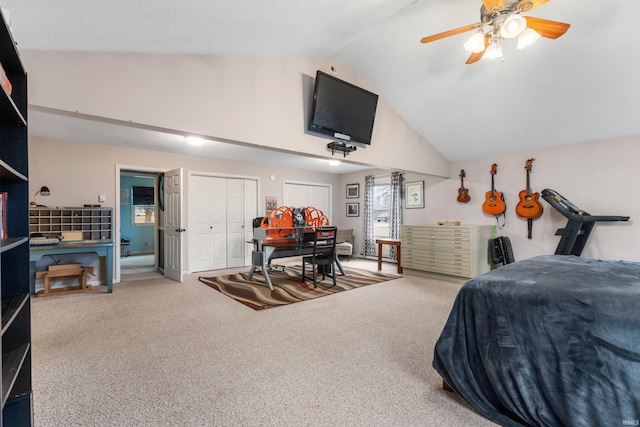 carpeted bedroom featuring a ceiling fan and lofted ceiling