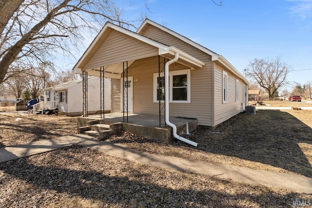 view of front of home with central air condition unit and covered porch