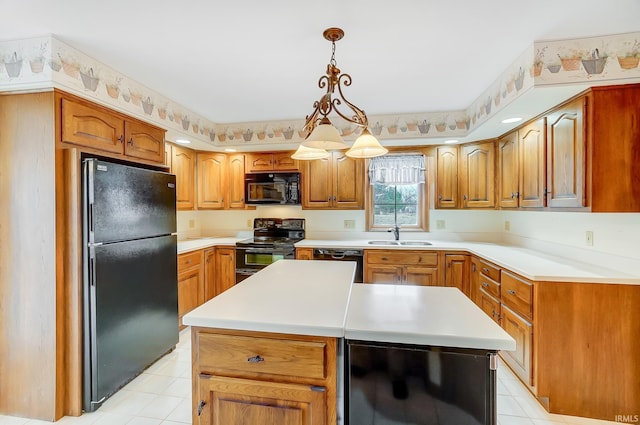 kitchen with a center island, beverage cooler, light countertops, black appliances, and a sink