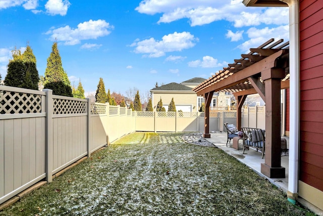 view of yard featuring a fenced backyard, a pergola, and a patio