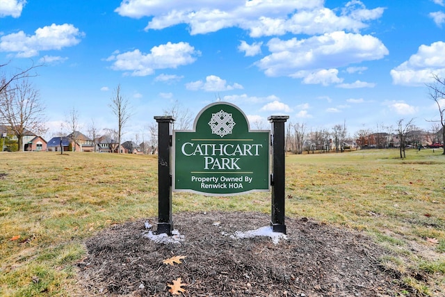 community sign with a lawn