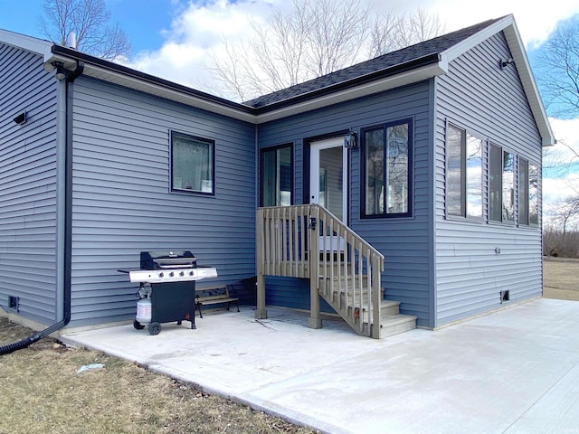 rear view of property with a patio area