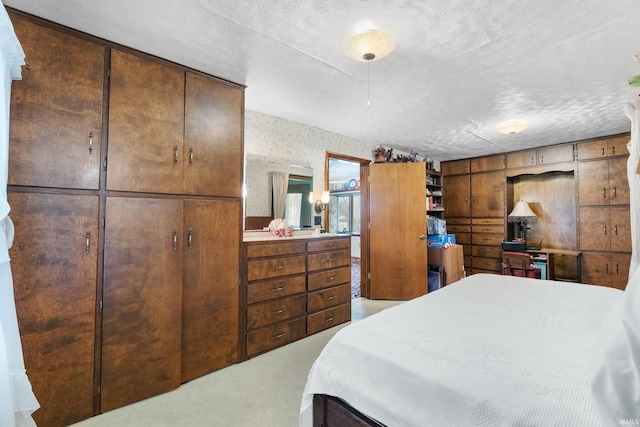 bedroom with light carpet