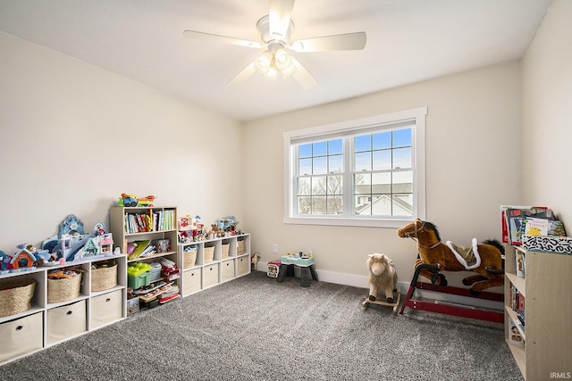 game room featuring a ceiling fan, baseboards, and carpet floors