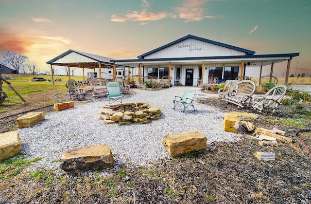 6889 N County Road 775 E, Grandview, IN 47615 - back of house featuring a fire pit