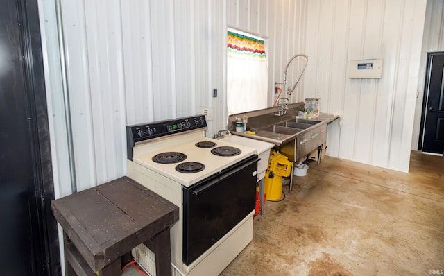 6889 N County Road 775 E, Grandview, IN 47615 - kitchen with electric range, concrete flooring, and a sink