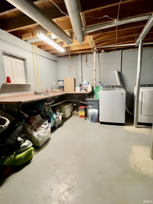 unfinished basement with independent washer and dryer