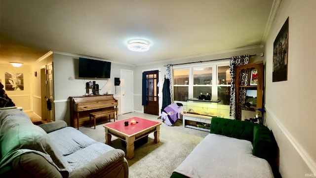 living room featuring ornamental molding and carpet floors