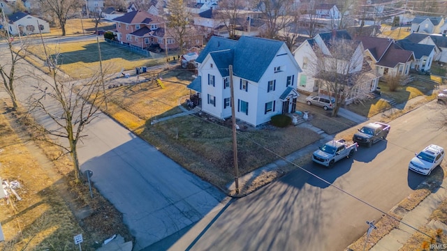 birds eye view of property with a residential view