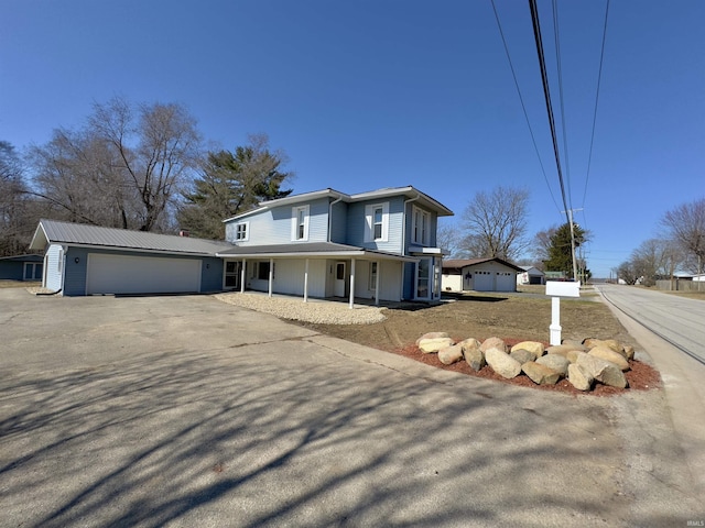 view of front of property featuring driveway and an attached garage