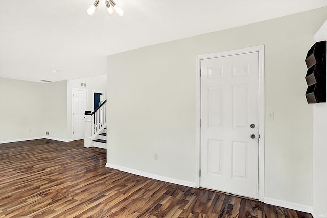904 S Deer Run, Ellettsville, IN 47429 - spare room featuring stairway, baseboards, visible vents, and wood finished floors