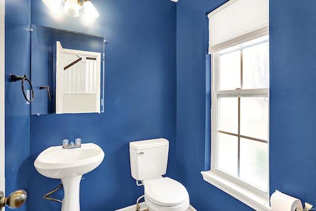 904 S Deer Run, Ellettsville, IN 47429 - half bathroom featuring baseboards and toilet