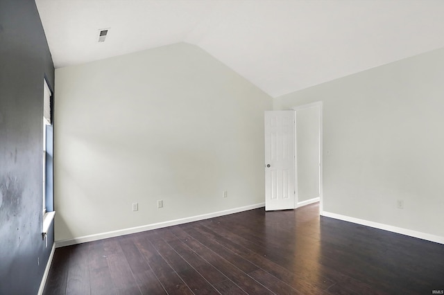904 S Deer Run, Ellettsville, IN 47429 - unfurnished room featuring visible vents, baseboards, wood finished floors, and vaulted ceiling