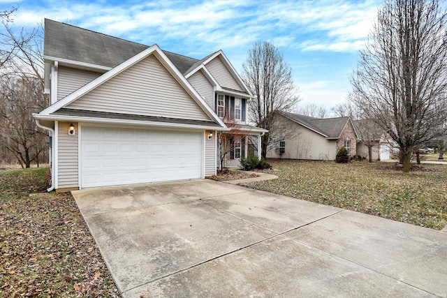 traditional-style home with driveway and an attached garage