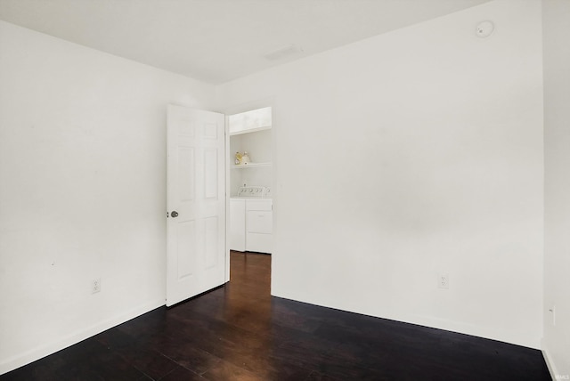 904 S Deer Run, Ellettsville, IN 47429 - spare room with dark wood-type flooring and separate washer and dryer