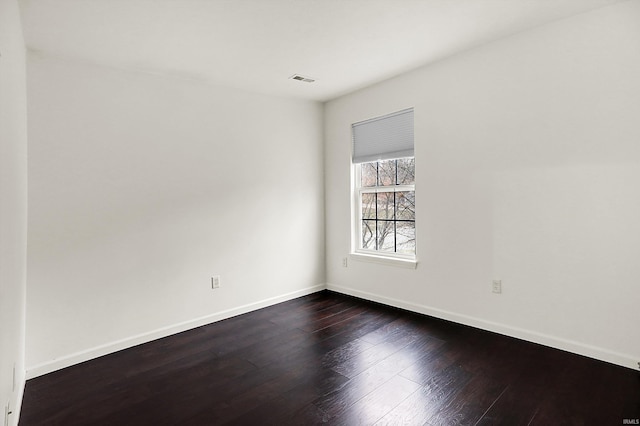 904 S Deer Run, Ellettsville, IN 47429 - unfurnished room featuring baseboards and dark wood-type flooring