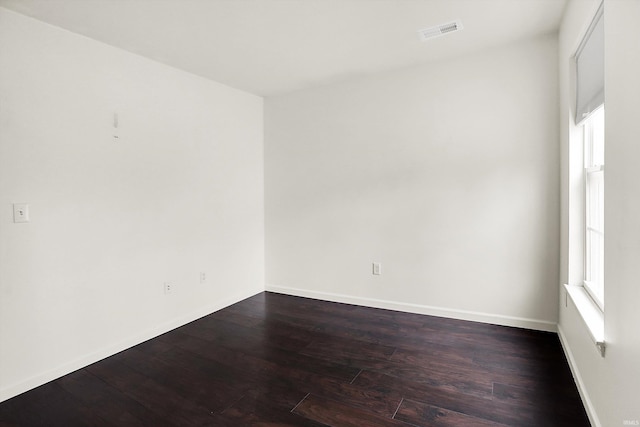 904 S Deer Run, Ellettsville, IN 47429 - empty room with baseboards, visible vents, and wood-type flooring