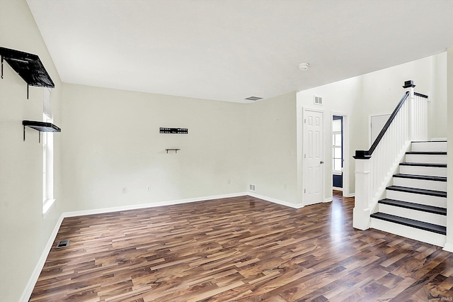 904 S Deer Run, Ellettsville, IN 47429 - spare room featuring visible vents, a healthy amount of sunlight, wood finished floors, and stairs