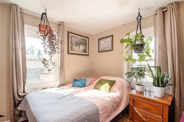 bedroom featuring multiple windows