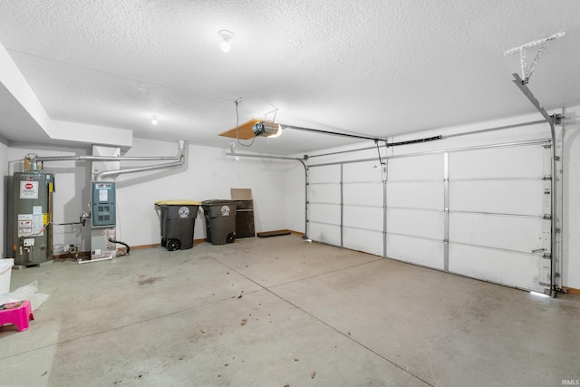 garage with water heater, a garage door opener, and baseboards